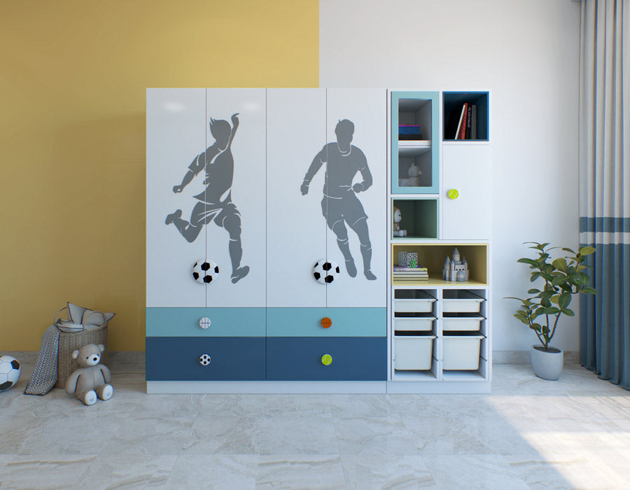 A children's room with a soccer-themed wardrobe, featuring silhouette decals of players, soccer ball knobs, and color accents; adjacent is a white shelving unit with books and toys, next to a potted plant.