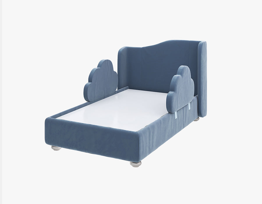 Stylish blue children's bed featuring a high backrest and cloud-shaped side rails, providing a playful and secure sleeping environment. The bed is upholstered in a soft blue fabric, offering a comfortable and charming addition to a child's bedroom.