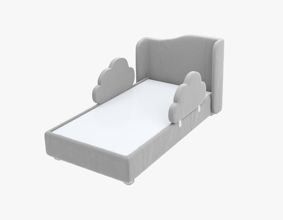 Stylish Grey children's bed featuring a high backrest and cloud-shaped side rails, providing a playful and secure sleeping environment. The bed is upholstered in a soft blue fabric, offering a comfortable and charming addition to a child's bedroom.