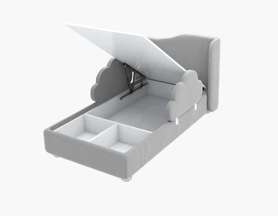 Functional grey children's bed with cloud-shaped side rails, featuring a lift-up mechanism that reveals spacious storage compartments underneath. The bed combines playful design with practical storage solutions, making it a perfect addition to a child's bedroom.