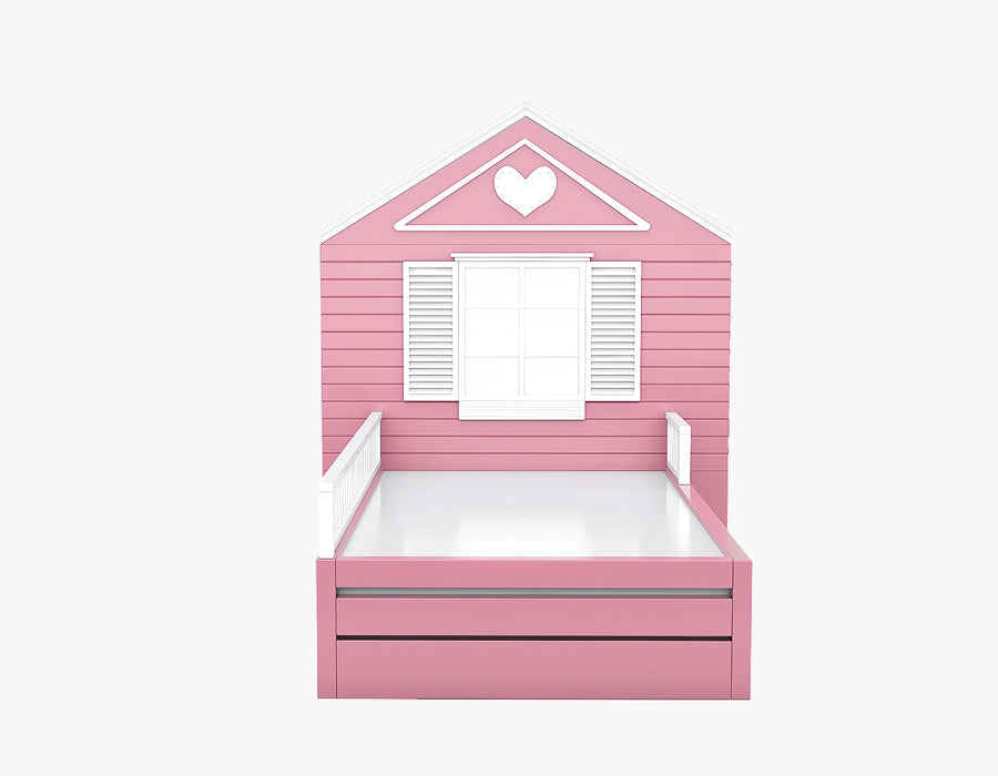 Front view of a pink children's bed with a house-shaped headboard, featuring white shutters and a heart decoration. The bed frame includes white side rails for safety, offering a playful and charming design for a cozy and inviting sleeping space in a child's bedroom.