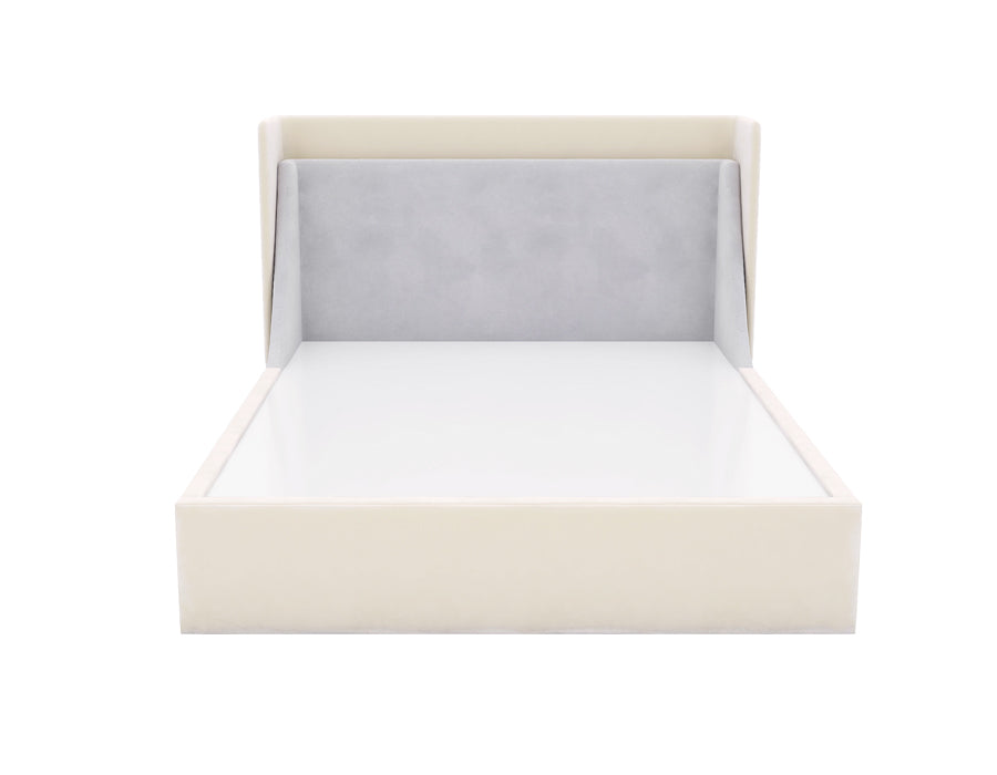 Cream-colored upholstered bed with a high, angled headboard featuring a soft gray fabric panel. The bed frame has a sleek and modern design, providing a cozy and stylish sleeping space for a child's bedroom.