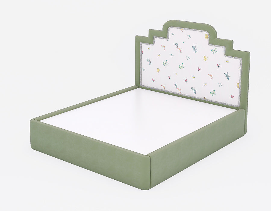 Kids' green upholstered bed with a charming butterfly and dragonfly print on the headboard. The side view highlights the sleek, padded design, combining comfort with a playful aesthetic, perfect for modern children's rooms.