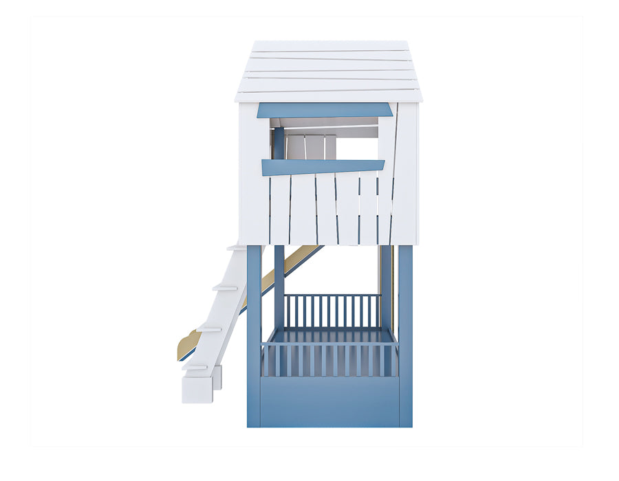 Side view of an isolated image of a wooden cabin-shaped children's bed with a smooth slide and sturdy ladder. The bed features decorative blue shutters and a white finish, designed to stimulate creative play and complement a kid's bedroom decor.