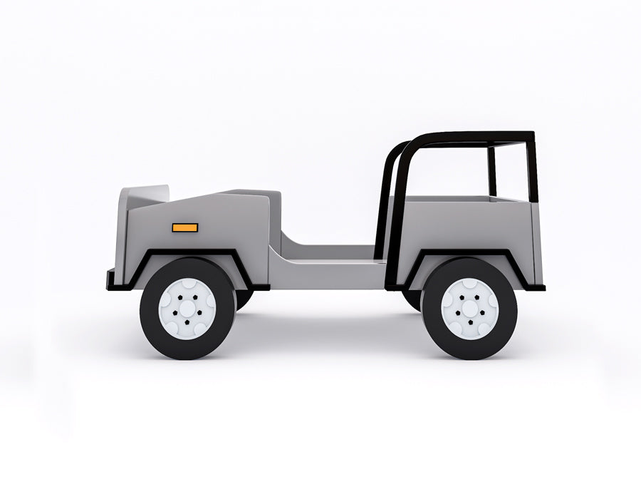 Side view of a children's jeep-themed bed in grey and black, designed to resemble a realistic vehicle with detailed features such as wheels, headlights, and a roll bar. This fun and adventurous bed offers an imaginative sleeping space for kids, blending playful design with practicality.