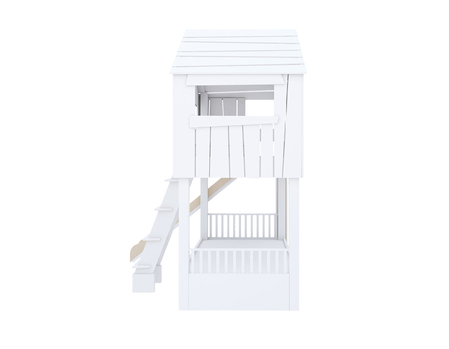 Side view of an isolated image of a wooden cabin-shaped children's bed with a smooth slide and sturdy ladder. The bed features decorative white shutters and a white finish, designed to stimulate creative play and complement a kid's bedroom decor.