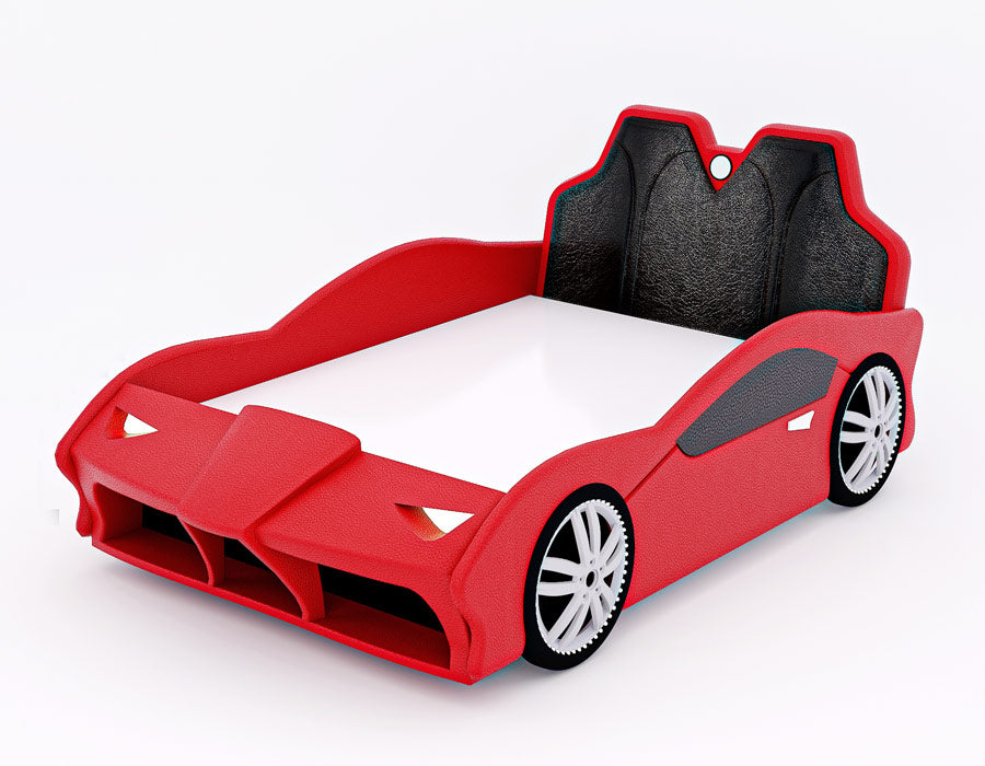 Red car-shaped children's bed with a sleek, sporty design and integrated cushioned headboard resembling car seats. The bed features detailed wheel designs and front bumper elements, creating a realistic automotive appearance. The bed frame is designed to look like a race car, perfect for a car-themed bedroom.