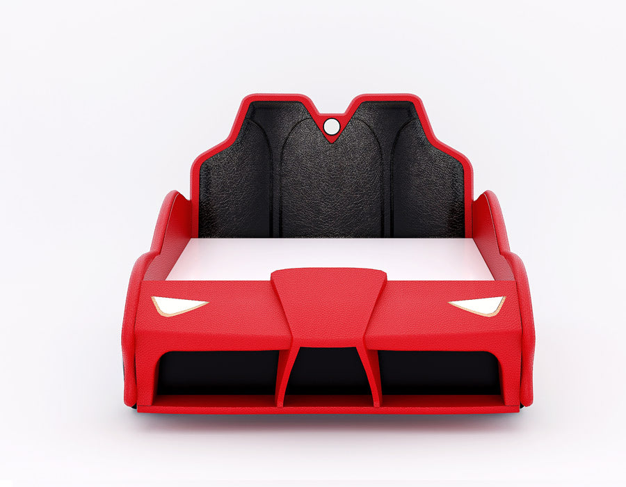 Front view of a red car-themed children's bed, featuring a realistic car front design with faux headlights and a cushioned black headboard that mimics car seats. The bed offers a playful, automotive-inspired look, perfect for a child's bedroom with a focus on both style and comfort.