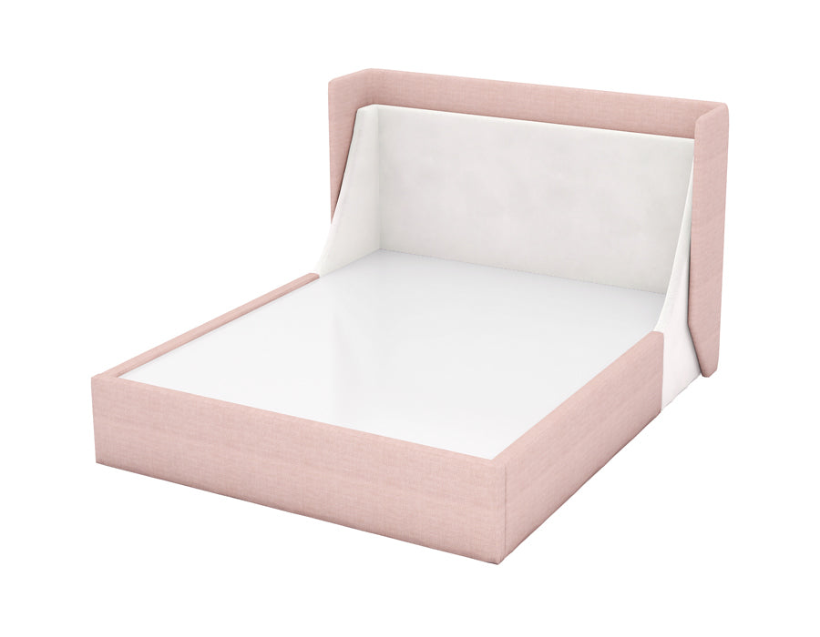 Pink-colored upholstered bed with a high, angled headboard featuring a soft gray fabric panel. The bed frame has a sleek and modern design, providing a cozy and stylish sleeping space for a child's bedroom. The angled headboard adds a unique and comfortable touch.