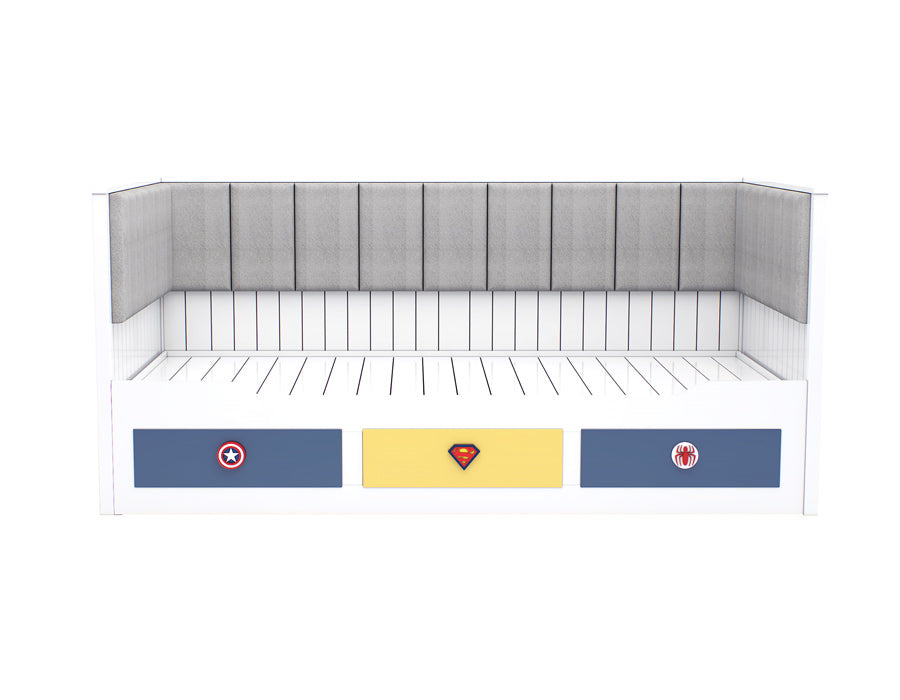 Front view of a white coloured children's trundle bed with superhero emblem drawers, showcasing a clean design with a comfortable, cushioned backrest.
